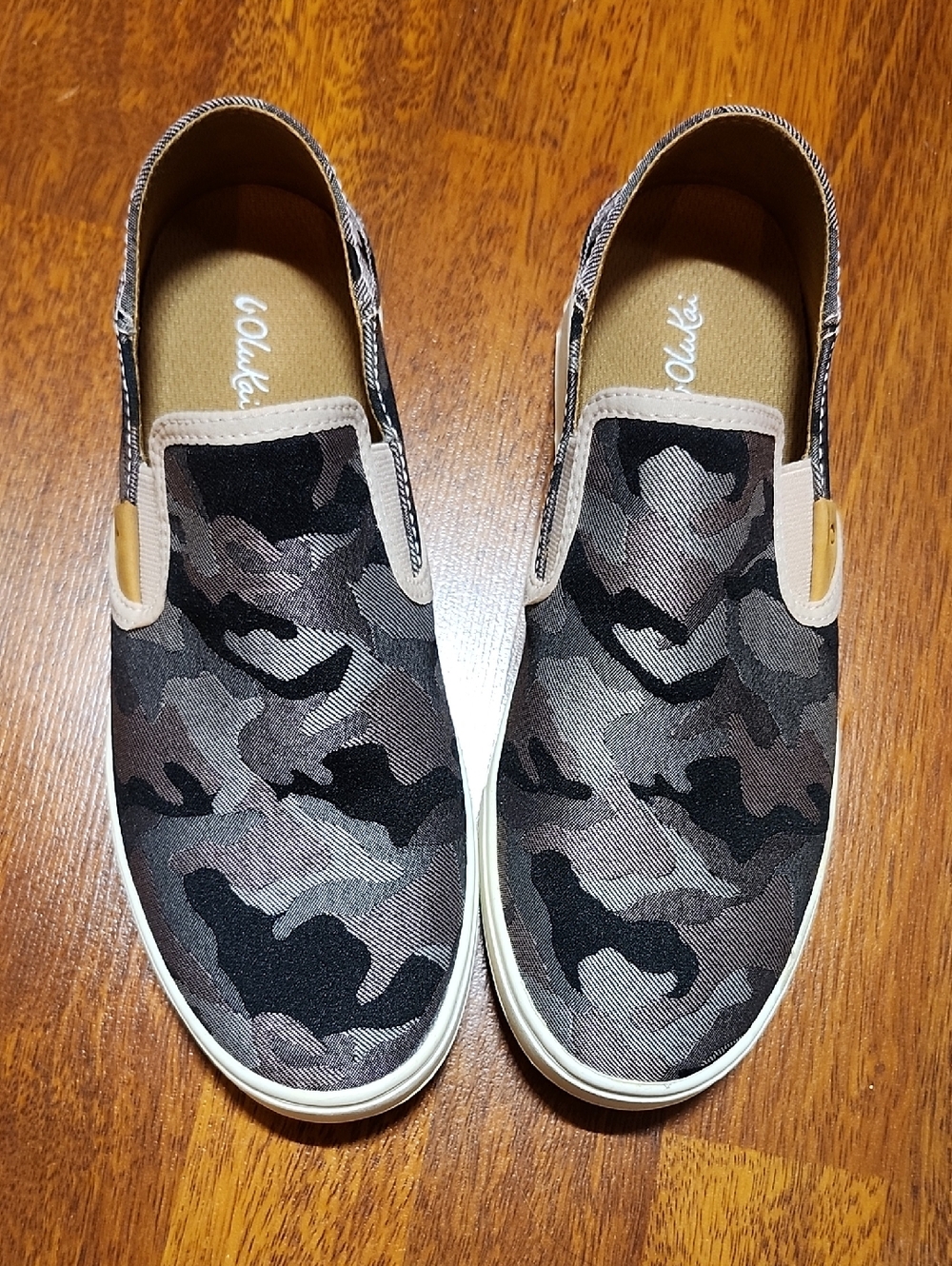 OluKai Women's Pehuea Black and Gray Camo Slip-On Sneakers